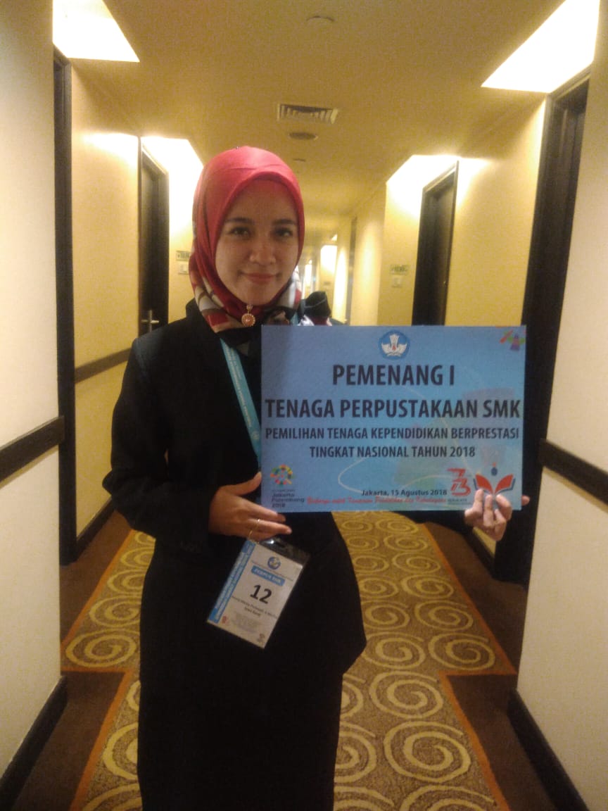 Emma Martia Fitriawati, S.I.Pust